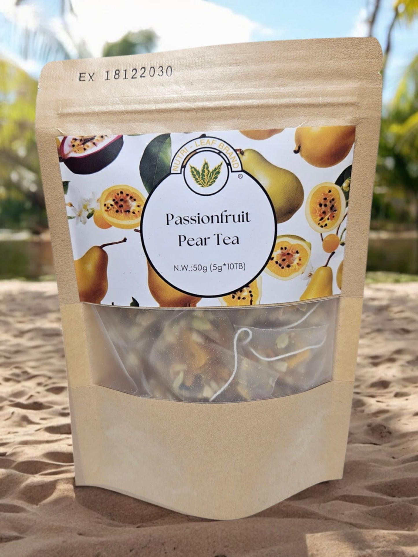 A package of Nutri-Leaf Passionfruit Pear Tea with a clear window showing the tea leaves inside. The packaging is predominantly white with images of passionfruits and pears and text detailing the product name and weight.